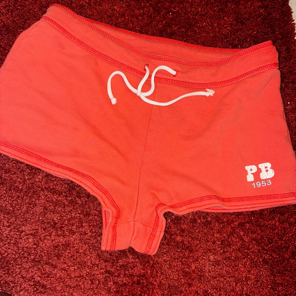 Gently Worn PLAYBOY Coral Red 🦑🦑Soft Athletic Shorts Sz MED.